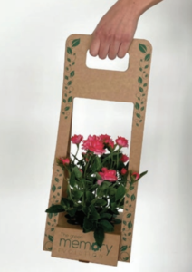 Support en carton recyclé qui accueille les pots de fleurs